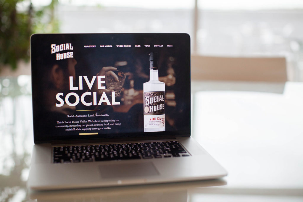 Live Social homepage on laptop