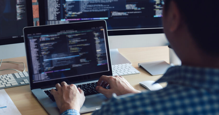 man working at computer